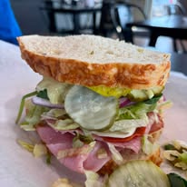 Fresh Deli Sandwich Layered with Sliced Ham, Pickles, Lettuce, and Red Onions on Toasted Artisan Bread | O-Daddy's Brick Oven Sandwiches